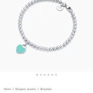 Tiffany & Co. Silver Bracelet with Turquoise Heart Charm never worn. Brand new